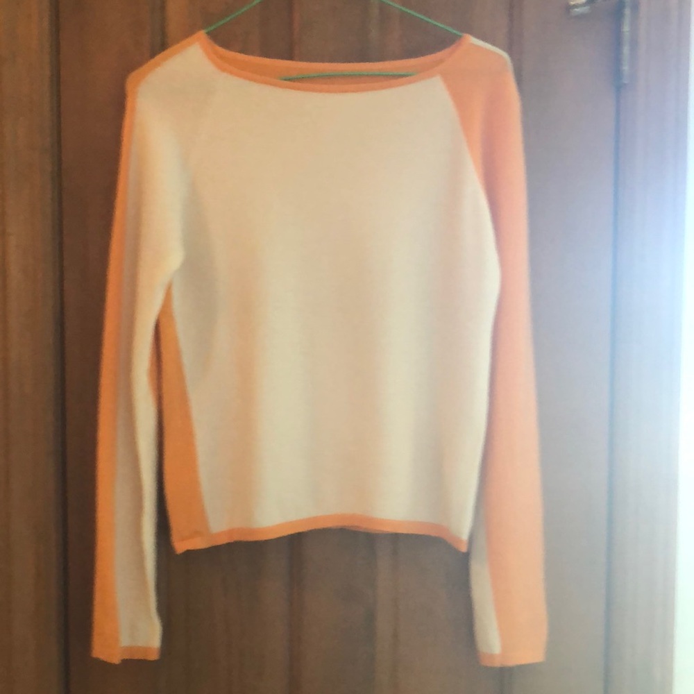 Orange and cream color-block cashmere sweater